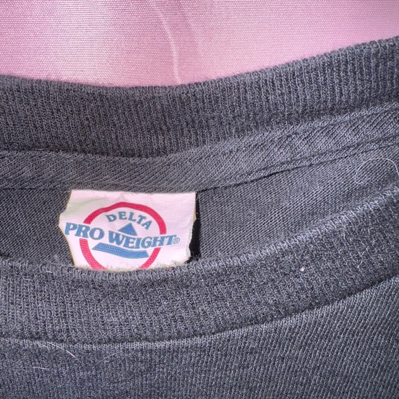 Delta Black and Yellow Short Sleeve Tee with Graphic Design - Picture 3 of 3